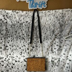 901. Steve madden cork board cross over